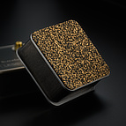 The base is covered with a thin layer of rubber/cork composite material. This keeps it from making electrical contact with your surface of choice, and also protects against abrasion and slippage.